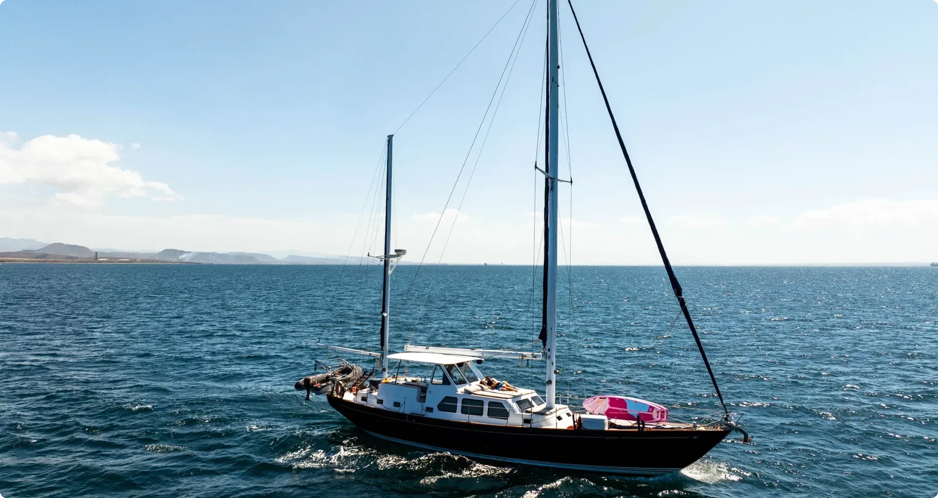sailboat navigating in the sea baja nauticos
