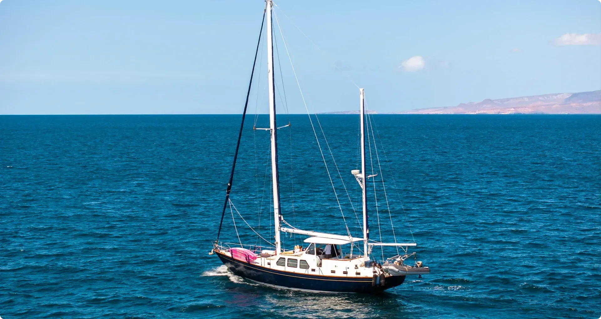 Sailboat sailing towards the high seas